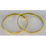 Two 22ct Stiff Bangles, Modern, total gross weight 23.2g