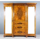 A Late 19th/Early 20th Century Figured Walnut and Marquetry Wardrobe with Recessed Centre, the whole