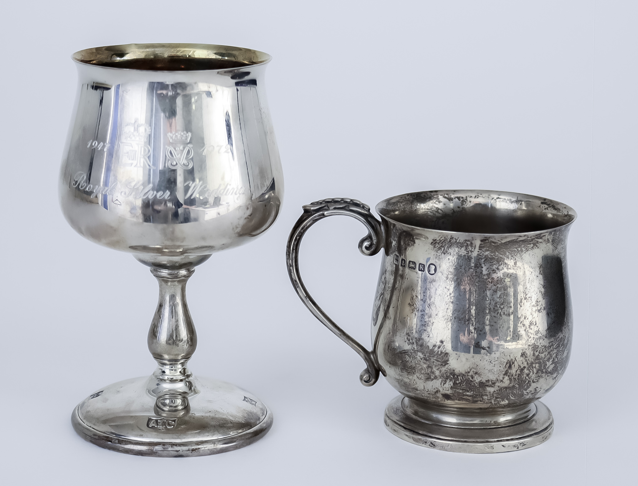 An Elizabeth II Silver Goblet and George V Silver Christening Mug, the goblet by A.T. Canon,