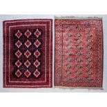 Two Belouch Rugs of "Turkmen" Design, Late 20th Century, one woven in colours of navy blue, wine and