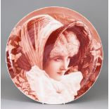 A Kennedy and Brown Pottery Charger, Circa 1881-1885, painted in orange by B. Twynam, with a
