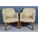 A Pair of 1930's Walnut Tub Shaped Library Armchairs in the Art Deco Manner, upholstered in old gold