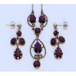 A 9ct Gold Necklace and Matching Earrings, Modern, the necklace set with five red faceted stones,