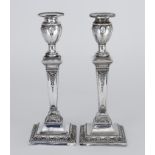 A Pair of Late Victorian Silver Pillar Candlesticks of "Neo Classical" Design, by Elkington & Co.