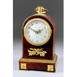 An Early 20th Century French Tortoiseshell and Gilt Brass Mounted Mantel Timepiece, by Maple & Co,