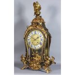 A Louis XV Tortoiseshell, Boulle and Gilt Brass Mounted Mantel Clock of Large Proportions, by
