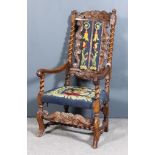 A Charles II Style Walnut Armchair, Late 19th/Early 20th Century, the high back with bold