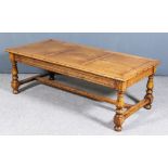 A Modern Oak Rectangular Coffee Table of "17th Century" Design, with flush panelled top and
