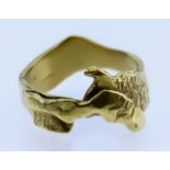 An 18ct Gold Ring, Modern, by Pleasance Kirk, in the style of a dolphin, size I+, gross weight 5.4g