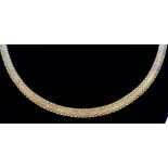 A 18ct Gold Flat Necklace, Modern, by Cartier, mesh entwined with a curved edge, 450mm overall, in