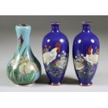 A Pair of Japanese Cloisonne Vases, decorated with a cockerel and hen, on blue ground, 4.75ins (12.