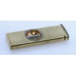 A 9ct Gold Cigar Cutter, Modern, 50mm x 16mm, gross weight 11g