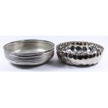 Two Continental Silver Circular Bowls, one with crimped rim and bulbous fluted body, 8.75ins