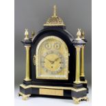 An Early Victorian Ebonised and Gilt Brass Mounted Mantel Clock, by Henry Borrell of London, the