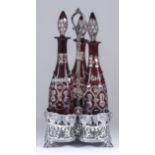 A Late Victorian Three-Division Wine Cruet, with leaf and fruit mounts and pierced sides, with