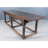 A Good 17th Century Oak Refectory Table, with cleated four-plank top, plain apron with moulded