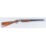 A Rare Over and Under 20 Bore Shotgun, by Beretta, Model 682, Serial No. D96466B/P50974B,