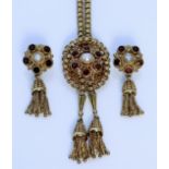An 18ct Gold Necklace and Earrings, Modern, in 18ct gold floral faced design, set with centre