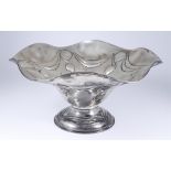 An Italian Silver Circular Pedestal Bowl, with shaped rim, embossed with swags and bead ornament, on
