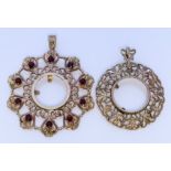 Two 9ct Gold Sovereign Mounts, with scroll borders, one inset with ten garnets, 54mm and 42mm
