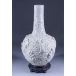 A Chinese White Glazed Porcelain Bottle Shaped Vase, Late 19th/20th Century, moulded in relief