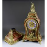 A 19th Century French Red Tortoiseshell, Boulle and Gilt Brass Mounted Mantel Clock of "Louis XV"