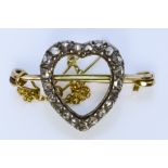 A Diamond Heart Shaped Brooch, Early 20th Century, in yellow coloured metal mount, 30mm x 19mm,