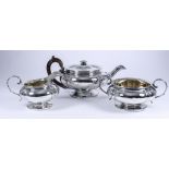 A George IV Silver Circular Three-Piece Tea Service, by William Eley & Charles Price, London 1827,