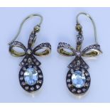 A Pair of Diamond and Topaz Earrings, the centre blue topaz stones, each approximately 1ct,