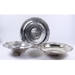 A Continental Silver Circular Dish and Two Circular Bowls, the dish with scroll cast rim, the centre