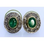 A Pair of Emerald and Diamond Earrings, Modern, for pierced ears, in white coloured metal mount, set