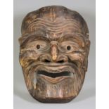A Japanese Carved Cyprus Wood and Lacquered Jijaku Mask (or similar dramatic tradition), 19th