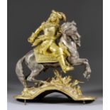 A 19th Century French Gilt and Silvered Brass Clock Cresting, depicting a horseman in 17th Century