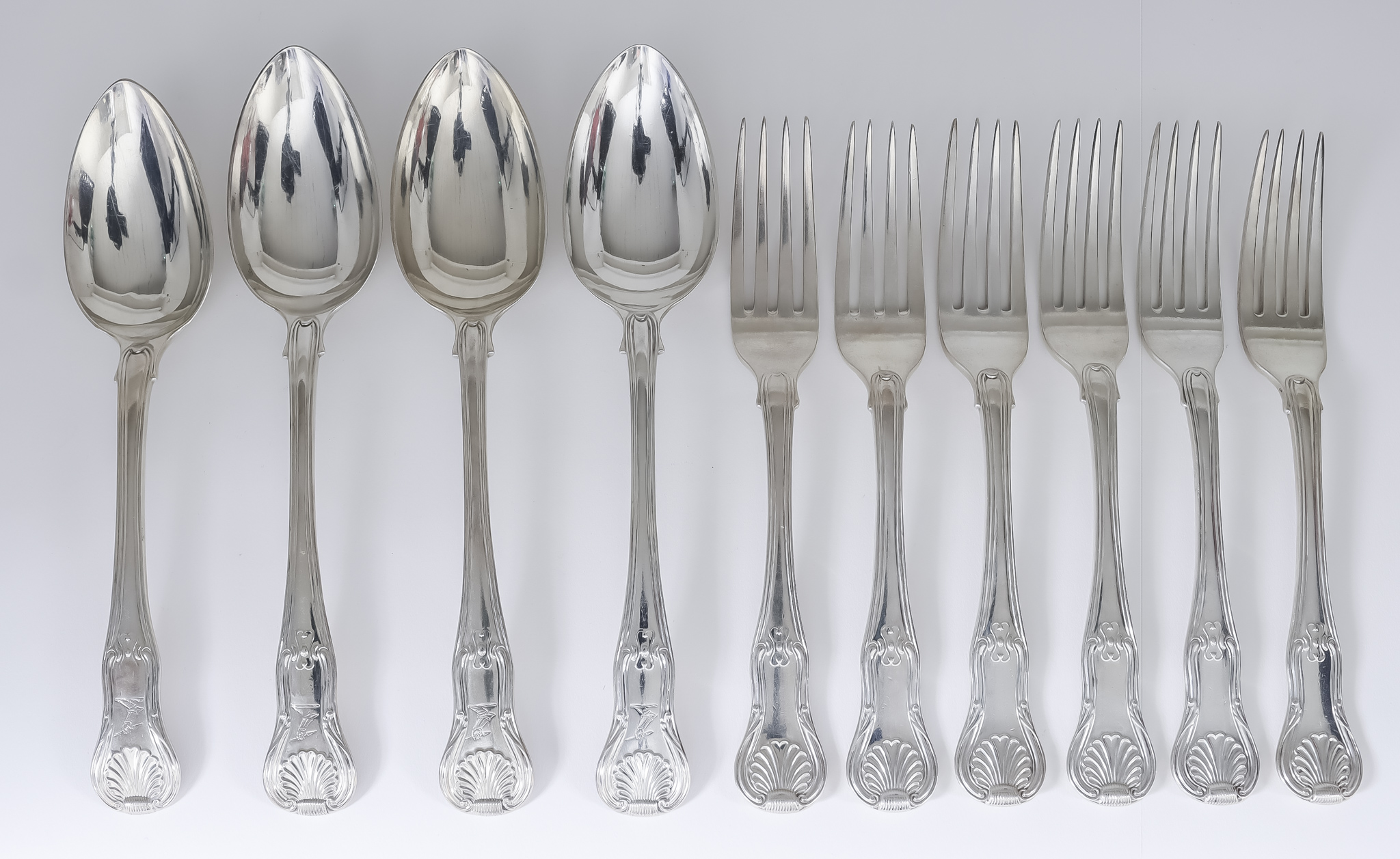 Six George III Silver Queens Pattern Table Forks, a Matching Table Spoon, and Three George IV