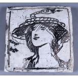 ***Quentin Bell (1910-1996) - Pottery tile decorated in sgraffito with portrait of a young girl,