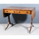 A George III Rosewood Sofa Table, with D-shaped flaps, inlaid in boxwood and contrasting stringings,