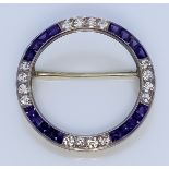 A Sapphire and Diamond Brooch, by Shreve, Crump & Low, set with sixteen small brilliant cut round
