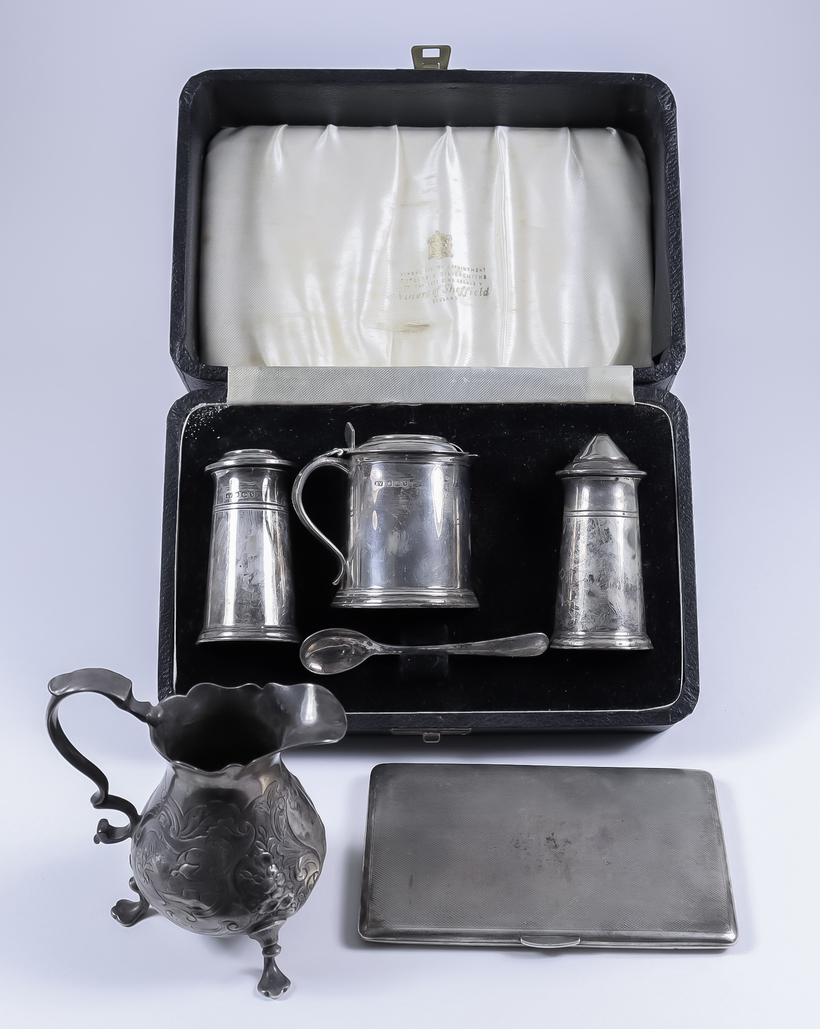 An Elizabeth II Silver Capstan Pattern Three-Piece Condiment Set, and Mixed Silverware, the