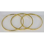 Three 22ct Stiff Bangles, Modern, total gross weight 27.8g