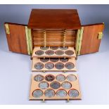 A Modern Mahogany Coin Cabinet, containing fourteen interior trays with selection of modern