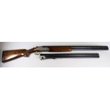 A 12 Bore Over and Under Shotgun, by Rizzini, Serial Nos. 63046/47, with two sets of 29.5ins and
