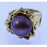An 18ct Gold Black Pearl Ring, Modern, by Pleasance Kirk, set with a black pearl, 13mm diameter,