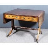 A George III Mahogany Sofa Table, with triple reeded edge to top and D-shaped flaps, fitted two real