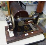 A VICKERS SEWING MACHINE IN DOME TOP WOODEN BOX