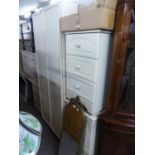 A SIMILAR TWO DOOR WARDROBE, 2'6" WIDE AND A PAIR OF THREE DRAWER BEDSIDE CHESTS