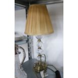 A BRASS AND GLASS TABLE LAMP AND SHADE