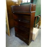 AN OAK FINISH MODERN OPEN BOOKCASE OF THREE TIERS WITH DRAWER IN BASE AND MATCHING CD RACK