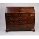 GEORGIAN MAHOGANY LARGE BUREAU, the fall front enclosing a well fitted interior with pigeon holes,