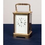 A POST WAR FRENCH CASED CARRIAGE CLOCK the white enamel dial inscribed "L'Epec - Sainte Susanne,