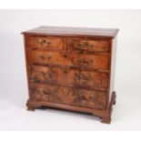 GEORGIAN FIGURED MAHOGANY CHEST OF DRAWERS OF SMALL PROPORTIONS, the moulded oblong top above two